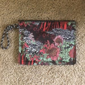 all zipped up pouch- new without tags. Never used.